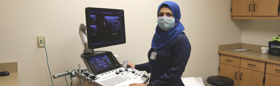 Dr. Al Zaghal with an ultrasound machine.
