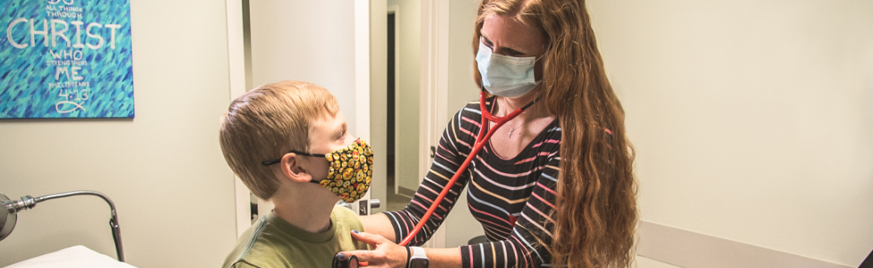 Dr. Angie Smutny treating a patient.