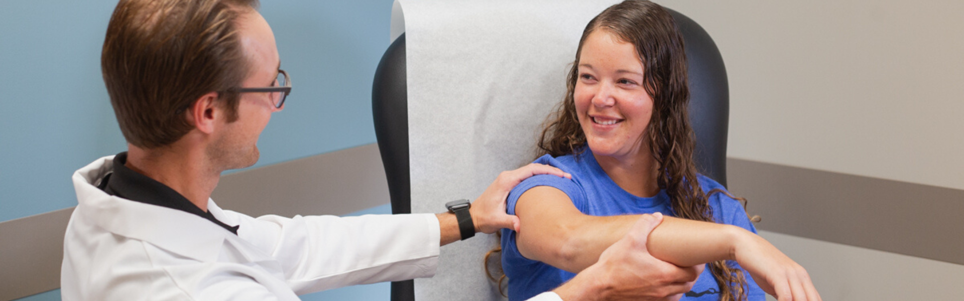 Dr. Jared Rickert, orthopedic surgeon, caring for a patient.